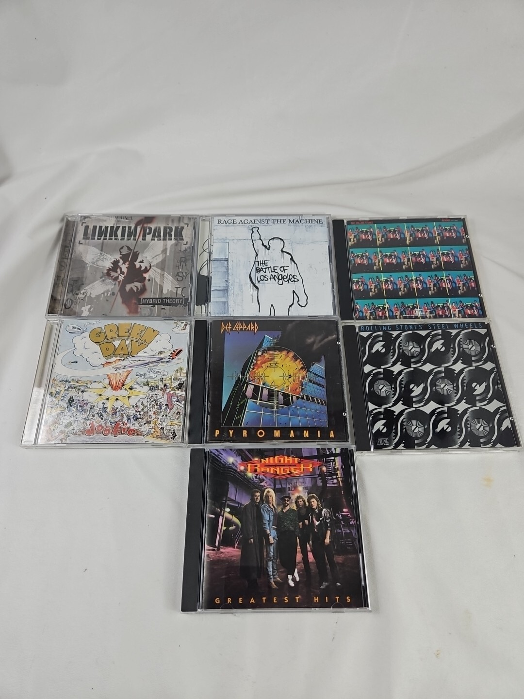 Lot of 7 CD- Green Day, Linkin Park, Rolling Stones, Def Leppard, RAGE Against