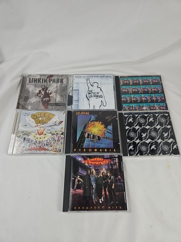 Lot of 7 CD- Green Day, Linkin Park, Rolling Stones, Def Leppard, RAGE Against