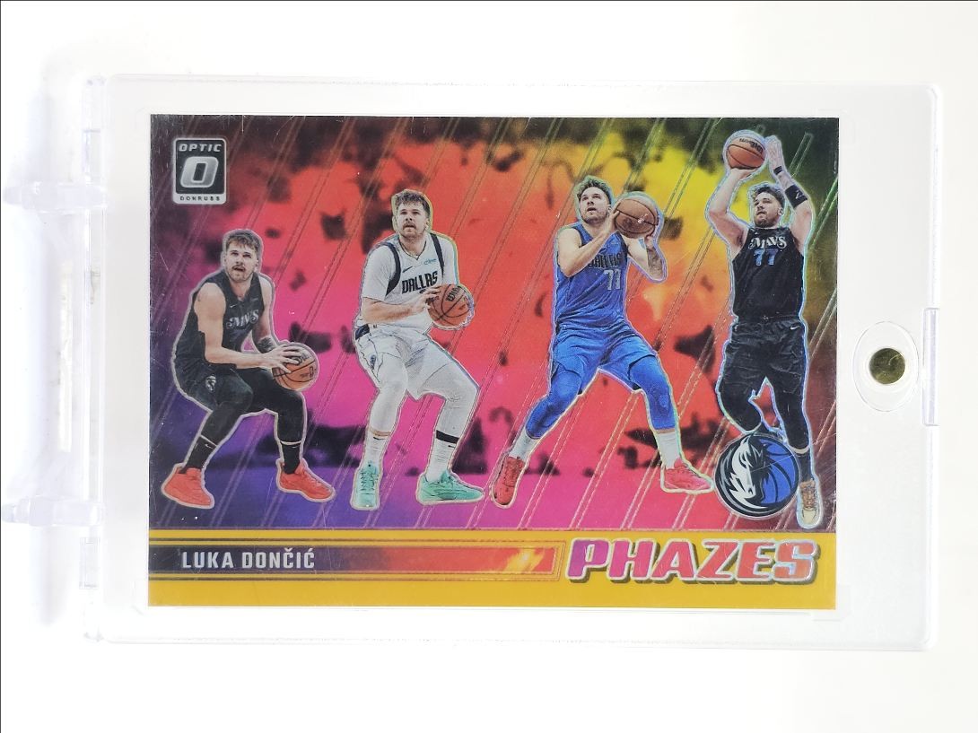 LUKA DONCIC 2023-24 DONRUSS OPTIC PHAZES GOLD PRIZM MAVERICKS /10 Q3403