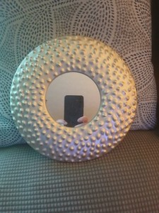 Round Silvertone Mirror. 10 inches across. Great Condition