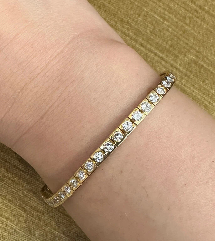 Brazalete redondo de diamantes línea tenis 5,00 cttw en oro amarillo de 18 k - HM2514B