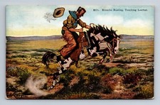 Postcard Bucking Broncho Busting Cowboy Touching Leather Saddle