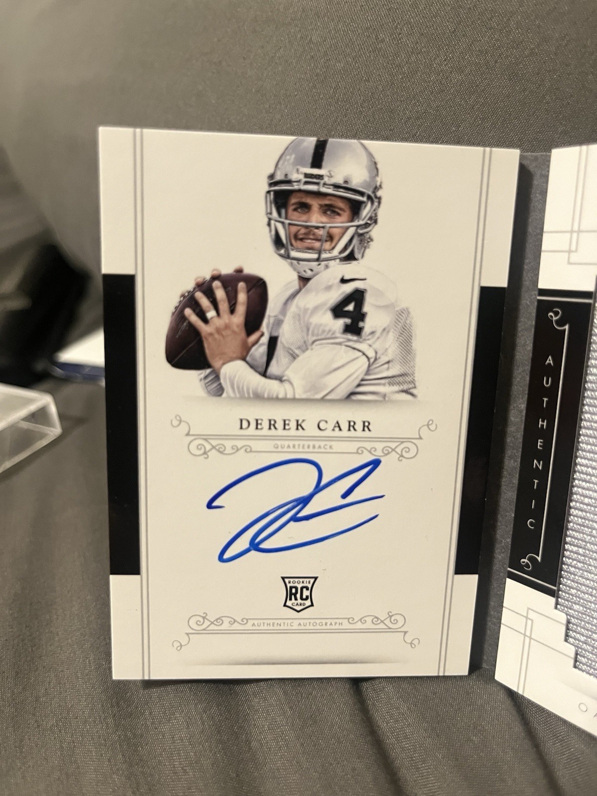 2014 National Treasures Derek Carr Jumbo Rookie Signatures Auto Booklet /99 view 2