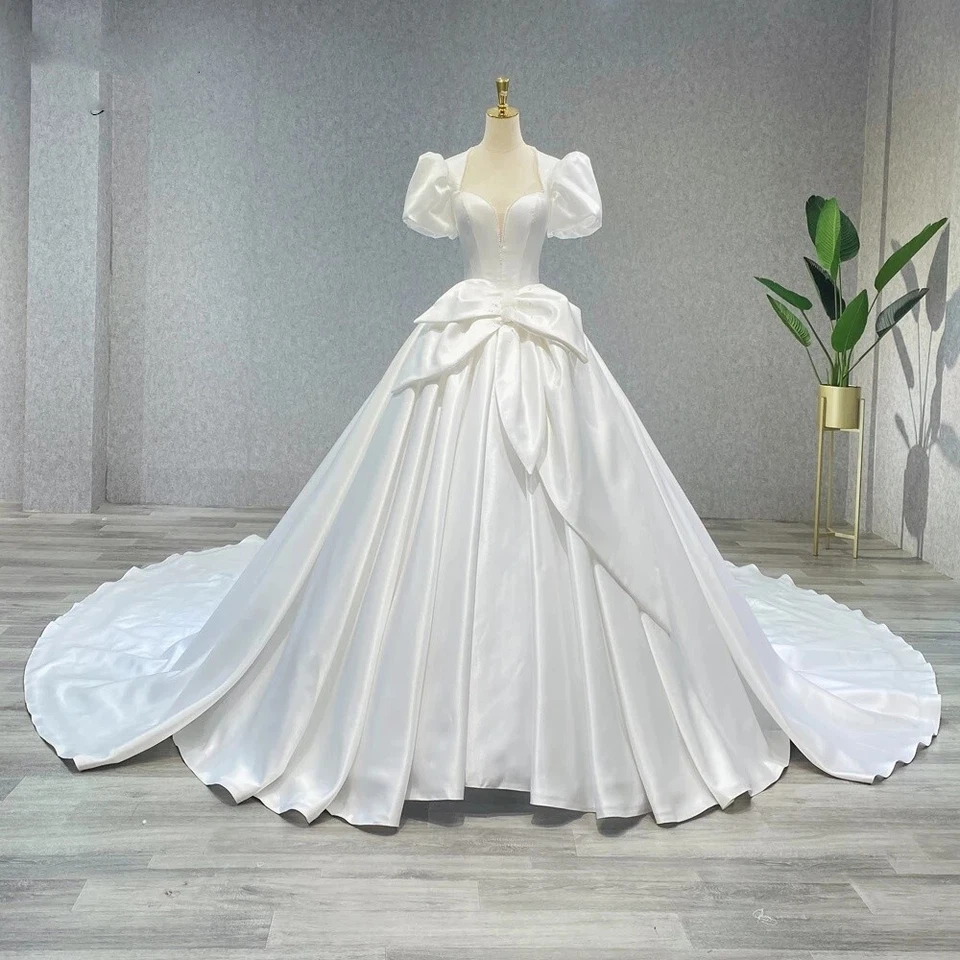 Vestidos de novia mangas abullonadas blancos marfil tren barrido satinado vestidos de novia con lazo Foto 2 de 4