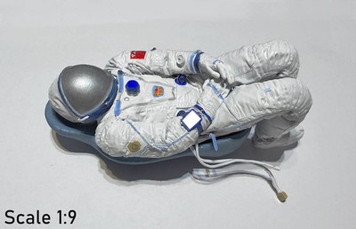 A self-painted cosmonaut in a Sokol KV2 spacesuit and a Kazbek seat insert 1:9