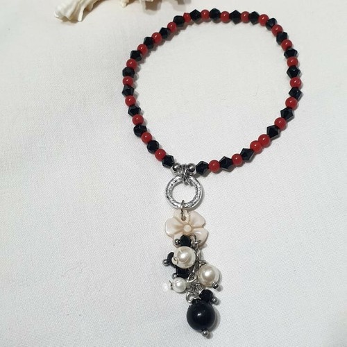 BRACCIALE CON CAMMEO IN PASTA DI CORALLO E ONICE , BRACCIALE ARGENTO CON FIORE - Foto 1 di 3