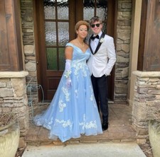 Light blue Cinderella style long prom dress or ball gown with train; wore once.