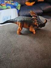 Unbranded Black And Brown Dinosaur- 5.5 Inches Long x 3 Inches Tall