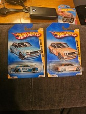 2009 HOT WHEELS NEW MODELS DATSUN BLUEBIRD 510 HW BLUE AND ORANGE LOT SEALED