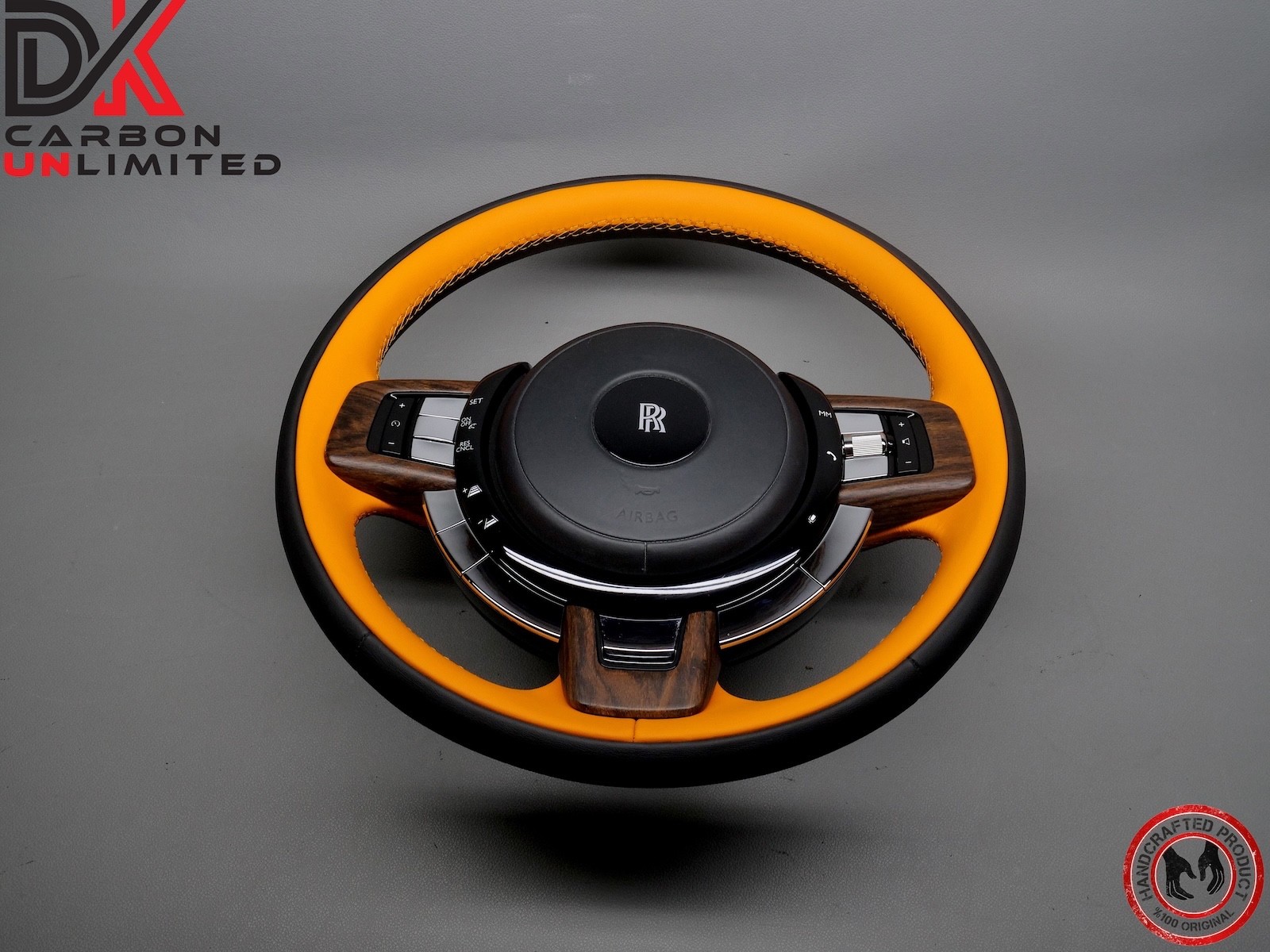 Rolls Royce Spectre Thick Rimmed Two Tone Black & Mandarin Stitch Steering Wheel