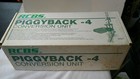 RCBS Piggyback 4 Unit-(87811)-IN BOX NEW ?? PROGRESSIVE PRESS ATTACHMENT