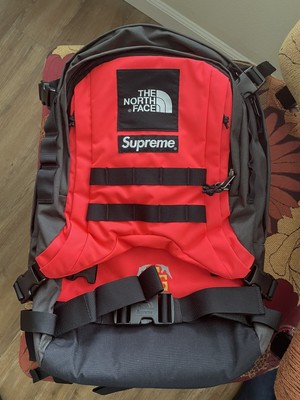 supreme north face backpack red