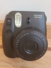 BLACK Fujifilm Instax Mini 8 Instant Film Camera. With one package of film