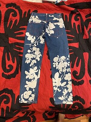 Vivienne Westwood blue denim pants with bleached floral Vivienne Westwood blue denim pants with bleached floral