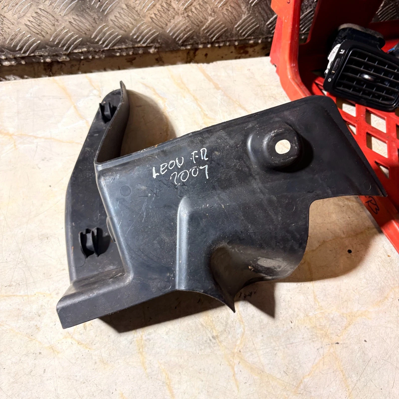 Actual driver footrest trim rear condition