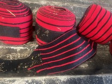 Exercise Bandages. Set of four Stretch black and red stripes. Touch close