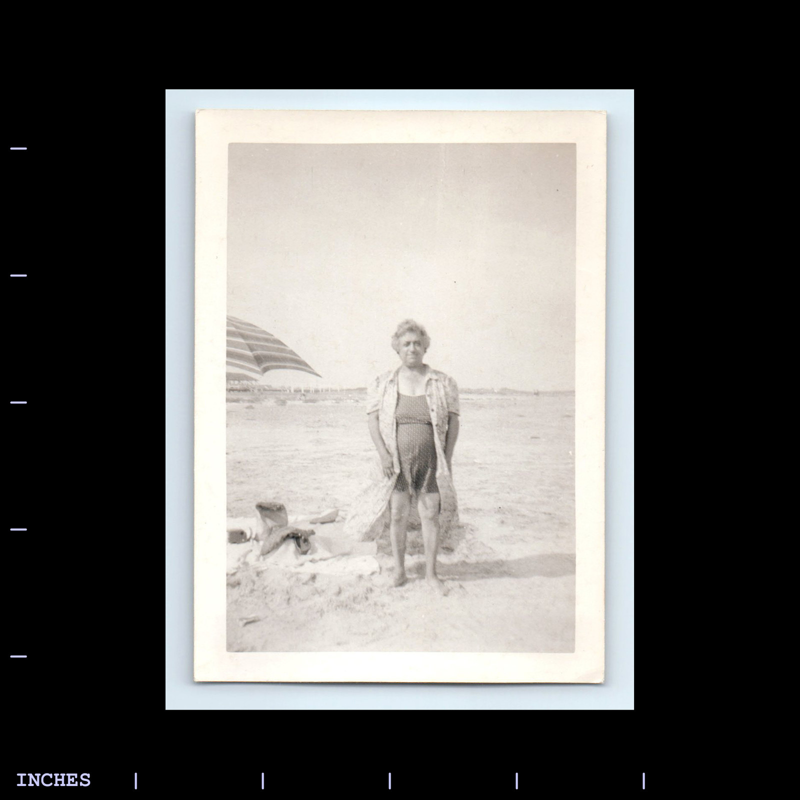 Vintage Beach Scene Woman Sitting Next to Umbrella Retro Photo