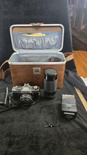 Minolta SLR 35mm Film Camera with Lens, Flash, and Carrying Case
