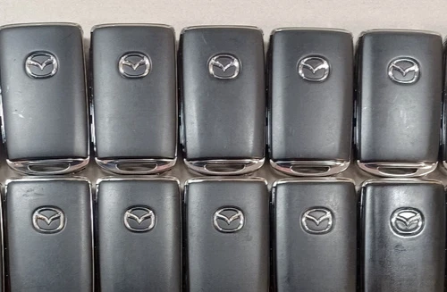 Lot of 10 Genuine OEM Mazda Remotes 4 Button Trunk BCYA-67-5DY  FCC:WAZSKE11D01 - product listing photo