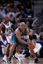 Guard David Wesley Charlotte Hornets posts up guard Greg Anthony - 2002 Photo