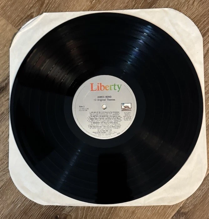 James Bond 13 Original Themes Vinyl Paul McCartney Louis Armstrong Carly Simon - Image 4 of 4