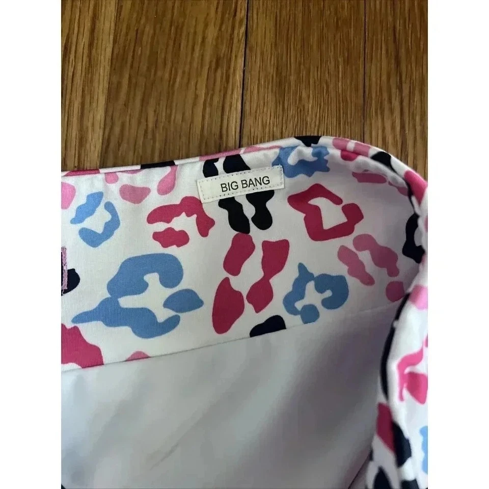 Falda corta de golf GOLFTINI Big Bang para mujer Pull On Tech blanca rosa azul falda con volantes S Foto 4 de 4