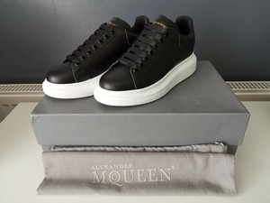black white sole trainers