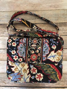 vera bradley bolsa with lots of pockets