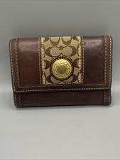 Vintage Coach Signature Tan Fabric And Brown Leather Trifold Wallet.