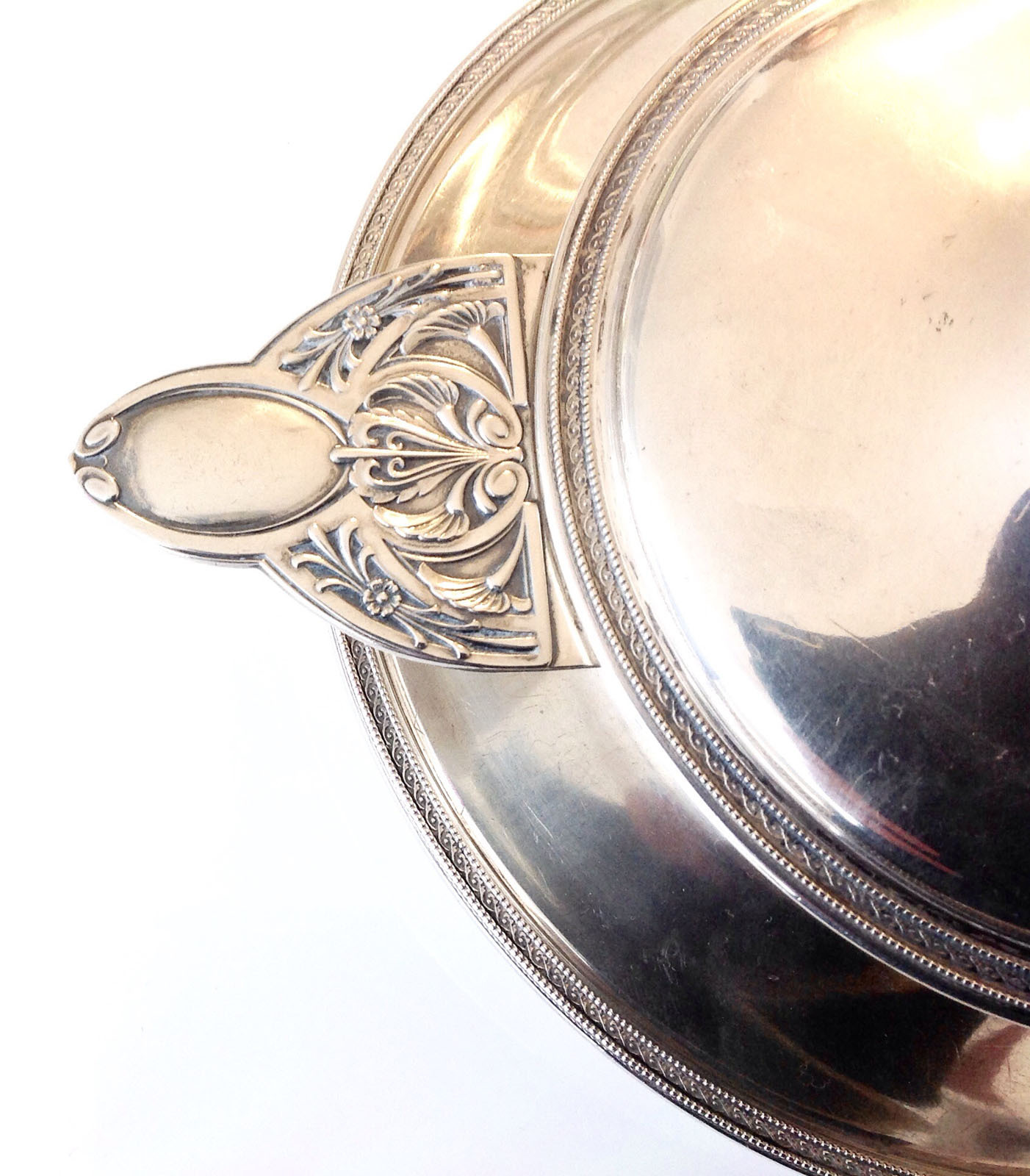 AN ANTIQUE SMALL SOLID SILVER WARMING DISH OR SAUCE BOWL PRODUCED BY