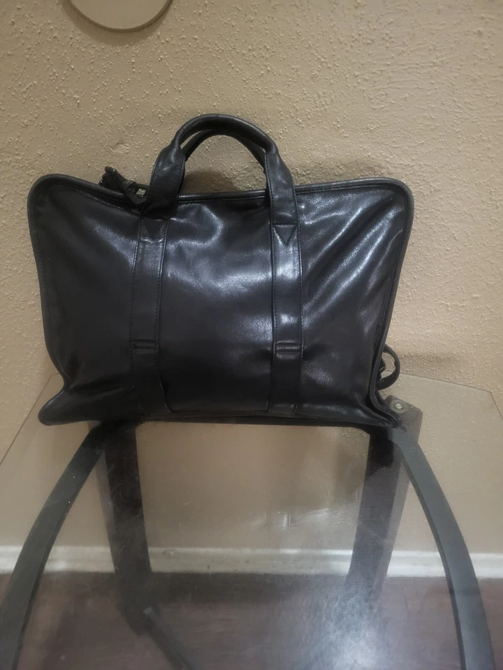 Bolso grande de cuero Tumi negro. El estado es bueno. Foto 3 de 4