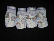 4 sample Luvs Paw Patrol overnights Size 6 over 35+Lbs.