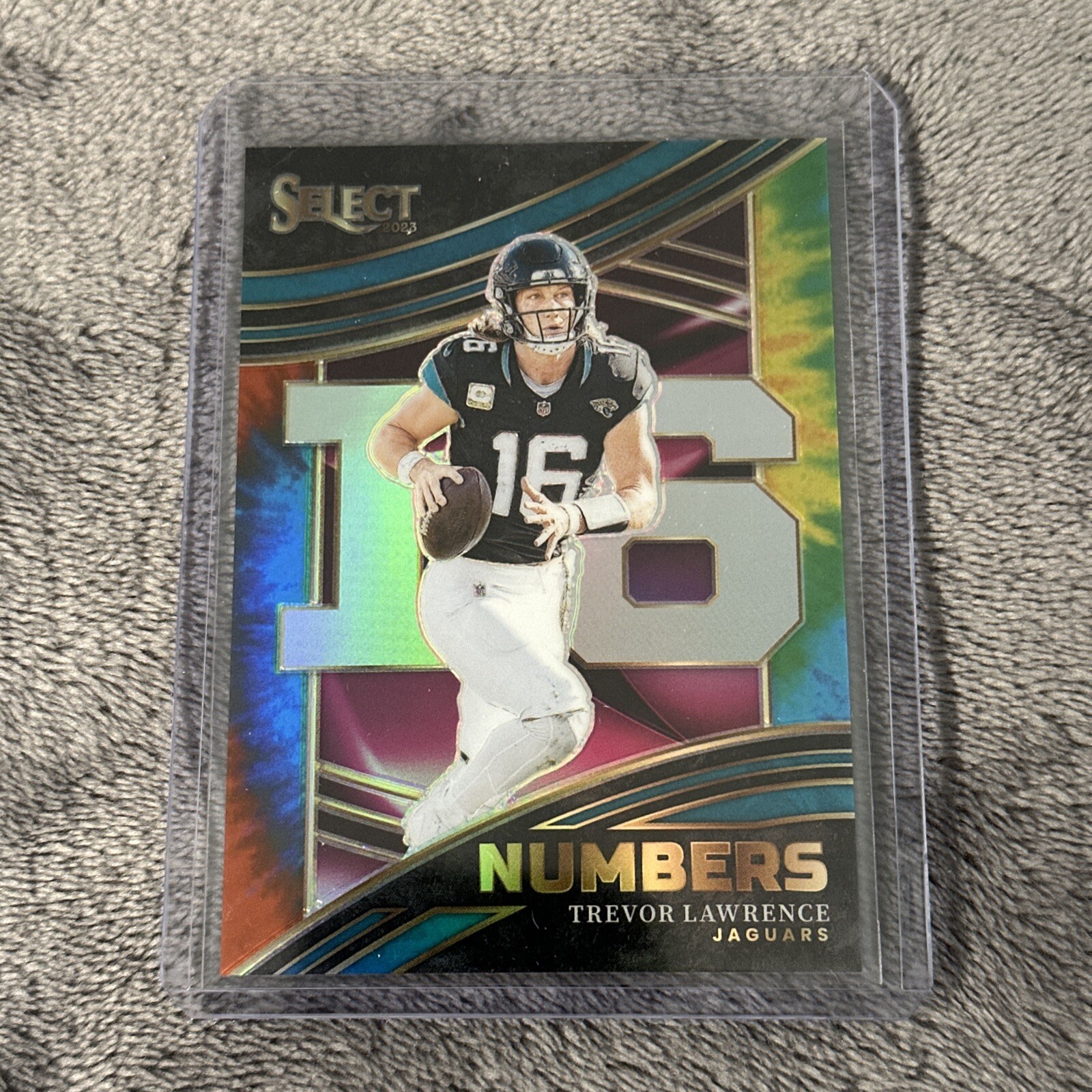 Trevor Lawrence #'d 16/25 Jersey #, 2023 Panini Select Numbers #NMB-TLA Tie Dye
