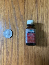 Vintage Glass Methiolate Bottle. 1/4 of fluid left inside.