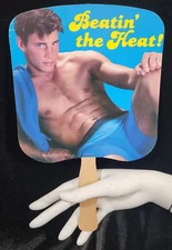 Beatin' the Heat! Sexy Hunk Man Paper Fan on a stick American Postcard Co. 1984