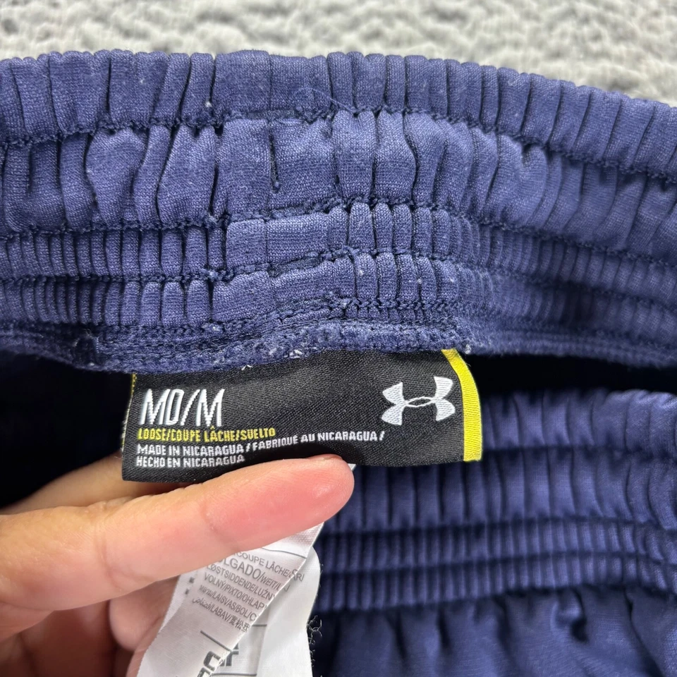 Pantalones deportivos Under Armour para hombre azul medio calce suelto logotipo de lobo equipo de lucha libre Foto 3 de 4