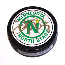 Dennis Maruk Minnesota North Stars Autographed Hockey Puck  A3464