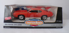 ERTL AMERICAN MUSCLE 1969 PONTIAC GTO JUDGE ORANGE VERY NEAR MINT BOXED 1:18