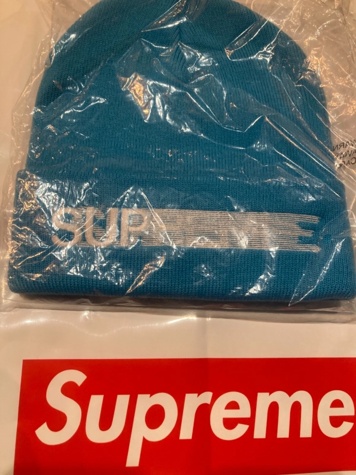 Bonnet logo Supreme Motion neuf bleu clair