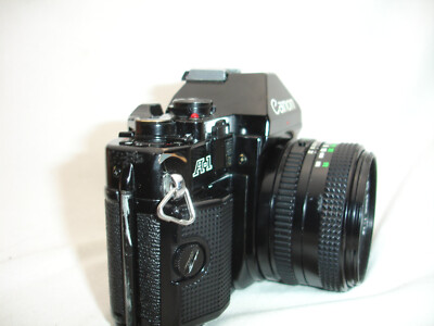 Canon A-1 35mm SLR Film Camera (sn143372) With 50mm f/1.8 lens