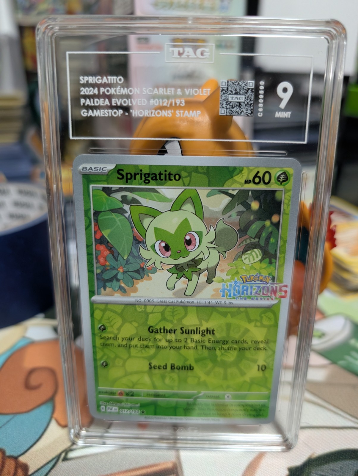 Pokemon Sprigatito 12/193 Reverse Holo GameStop Horizons Promo - TAG 9 Graded