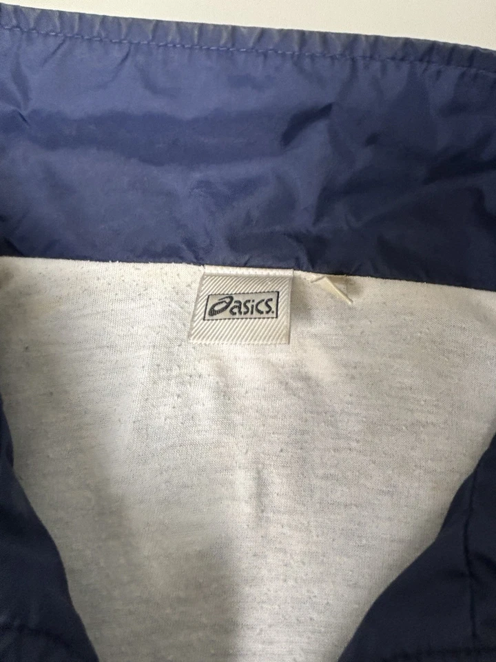 Chaqueta cortavientos vintage ASICS para hombre talla L azul blanco cremallera Y2K atlética Foto 3 de 4