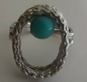 Sterling Silver Turquoise Oval Shaped Frame Ring