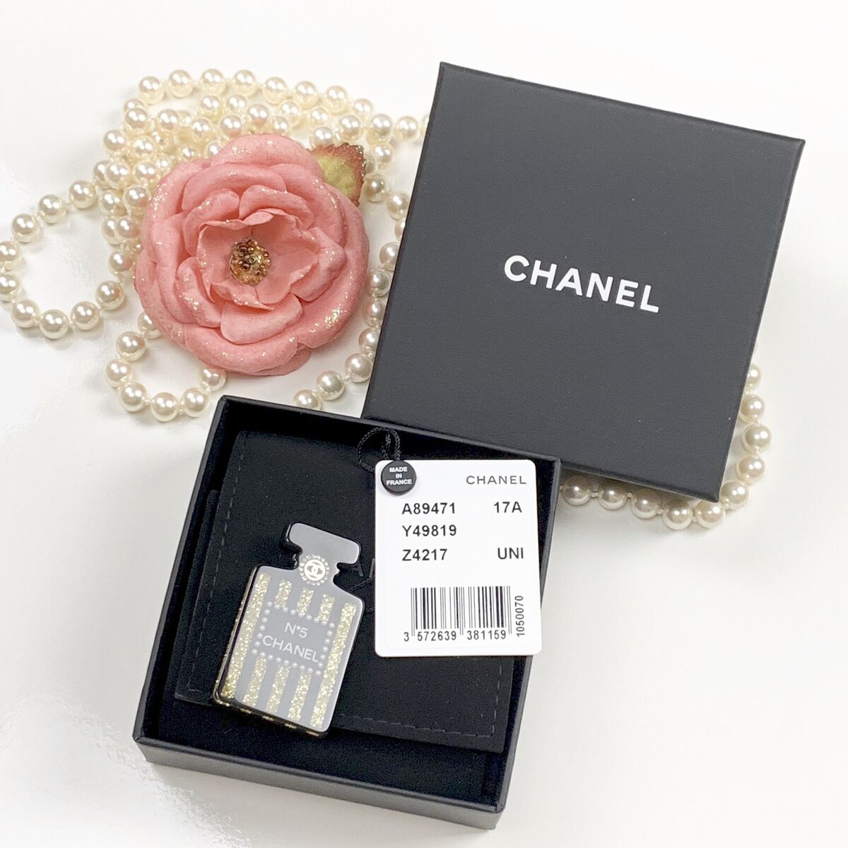 chanel perfume bottle brooch