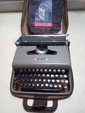 Machine à écrire Olivetti Lettera 22 avec Notice d'origine et sac transport