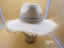 Straw Hat For Women. 100 Paper Straw . Made in China. Crown 5" Brim 3 1/2" .