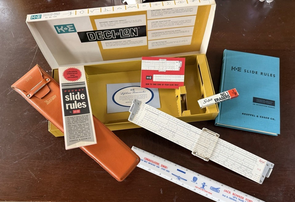 The K&E Deci-Lon is considered the pinnacle of American slide rule design — a complete, never-opened new-old-stock set is a genuine collector's holy grail.