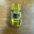 Vintage 1967 Hot Wheels Redline Ford J car Gold