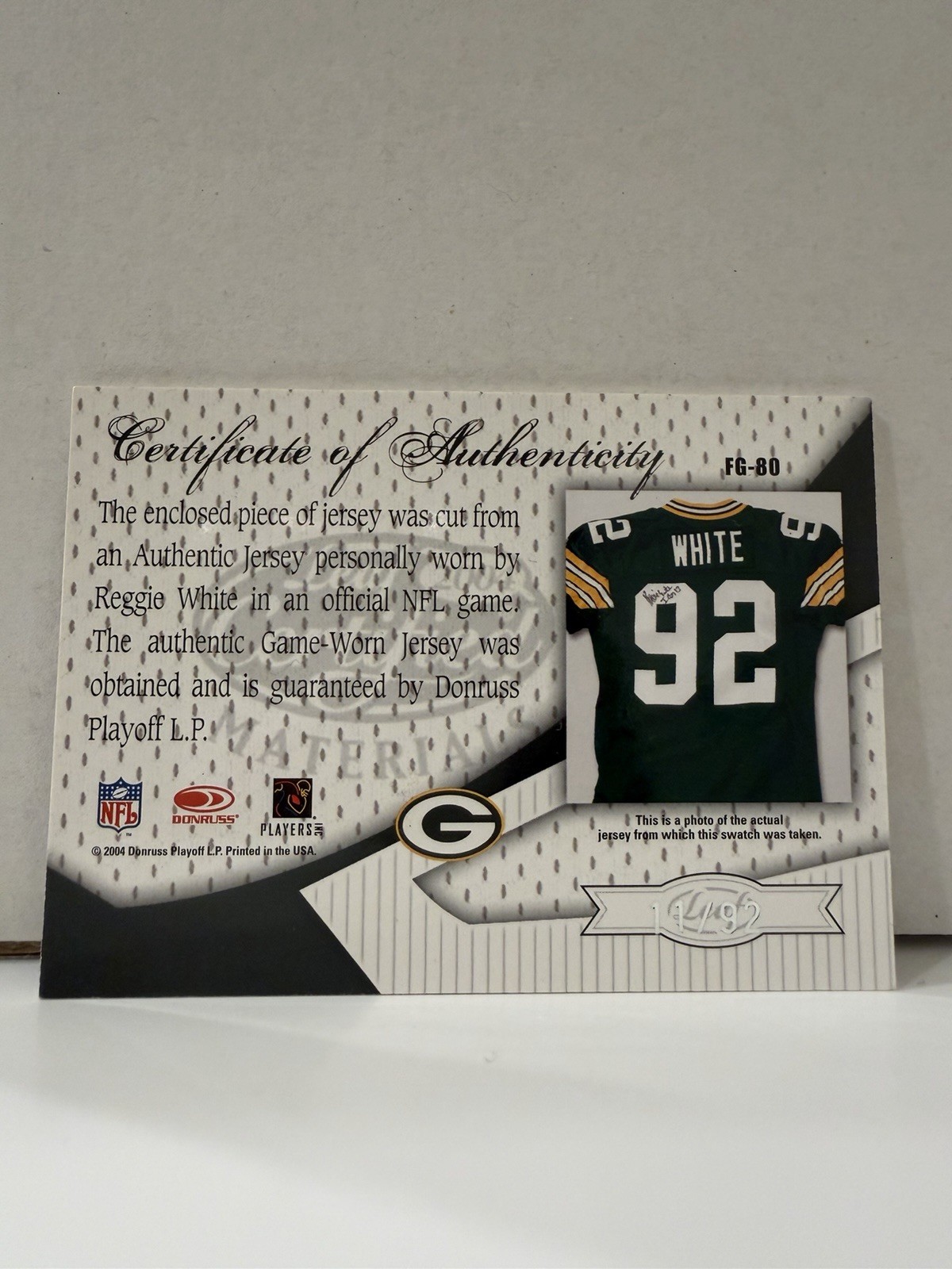 2004 Leaf Certified Materials Fabric Game Reggie White #FG-80 Jersey /92 Auto view 2