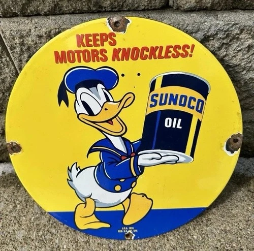 VINTAGE PORCELAIN ENAMEL SUNOCO DONALD DUCK KEEPS MOTORS KNOCKLESS GAS SIGN